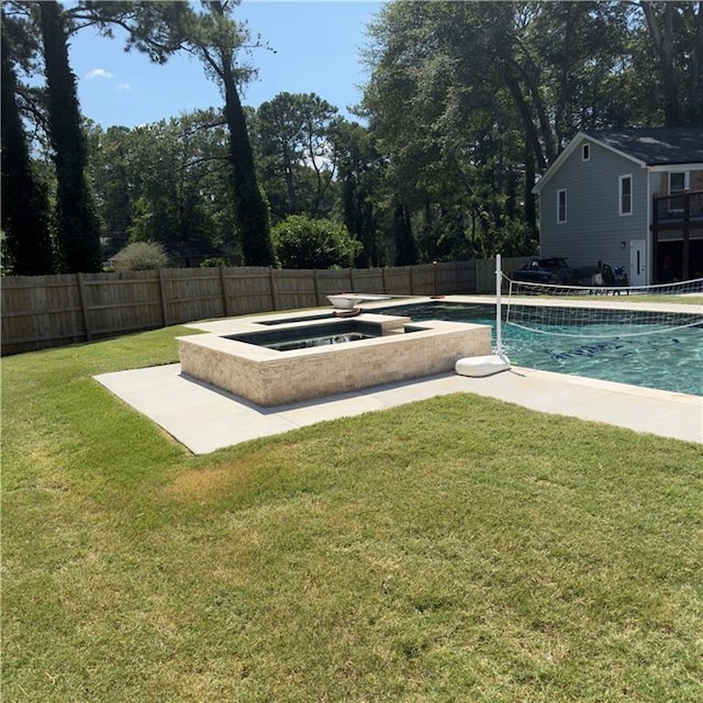 view of swimming pool featuring a fenced in pool, a fenced backyard, a lawn, and an in ground hot tub