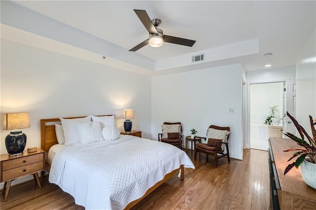 bedroom featuring ceiling fan and wood-type flooring