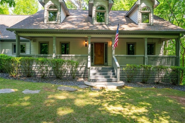 465 Willowbrook Dr SE, Smyrna, GA 30082 - view of front of property featuring a porch, a front lawn, and a shingled roof