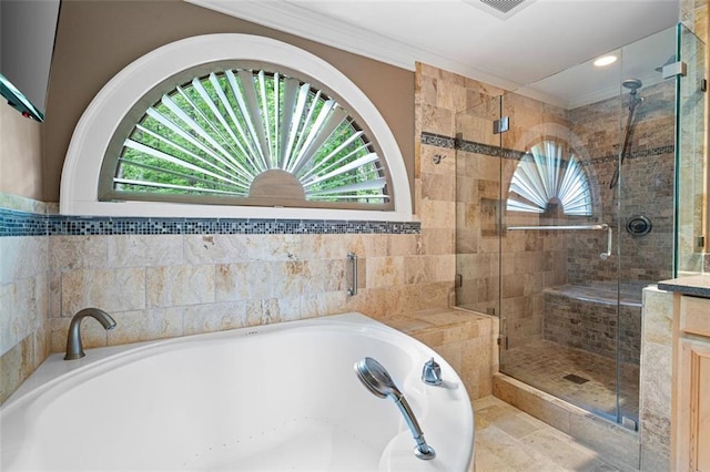 465 Willowbrook Dr SE, Smyrna, GA 30082 - bathroom featuring healthy amount of natural light, a garden tub, ornamental molding, and a shower stall