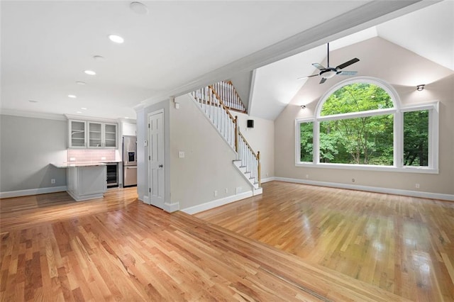 465 Willowbrook Dr SE, Smyrna, GA 30082 - unfurnished living room with stairway, ceiling fan, baseboards, light wood-style flooring, and recessed lighting