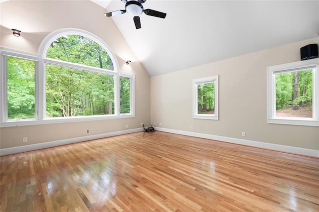 465 Willowbrook Dr SE, Smyrna, GA 30082 - unfurnished room with plenty of natural light, light wood-style floors, and vaulted ceiling