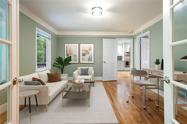 465 Willowbrook Dr SE, Smyrna, GA 30082 - living area featuring wood finished floors, ornamental molding, and baseboards