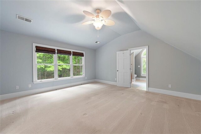 465 Willowbrook Dr SE, Smyrna, GA 30082 - additional living space with light carpet, vaulted ceiling, baseboards, and a ceiling fan