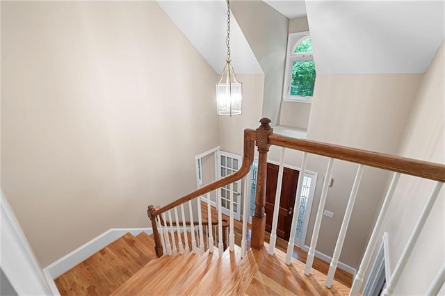 465 Willowbrook Dr SE, Smyrna, GA 30082 - stairway featuring lofted ceiling, wood finished floors, and baseboards