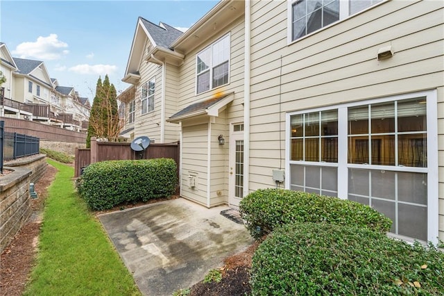 property entrance with a patio area