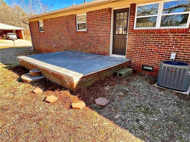 view of patio / terrace with central AC unit