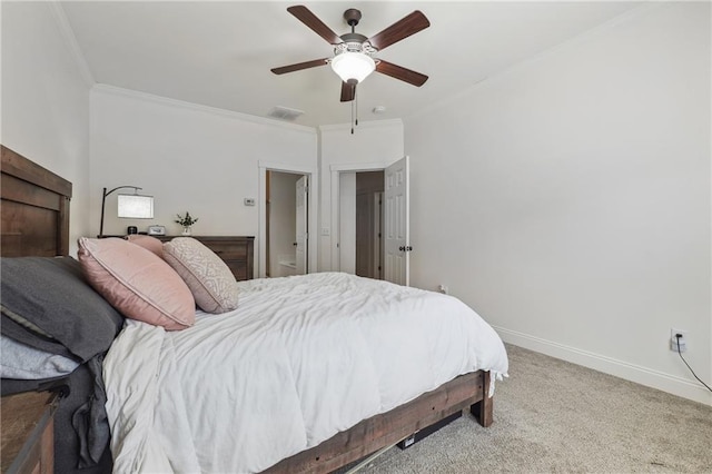 bedroom with carpet, ceiling fan, and ornamental molding