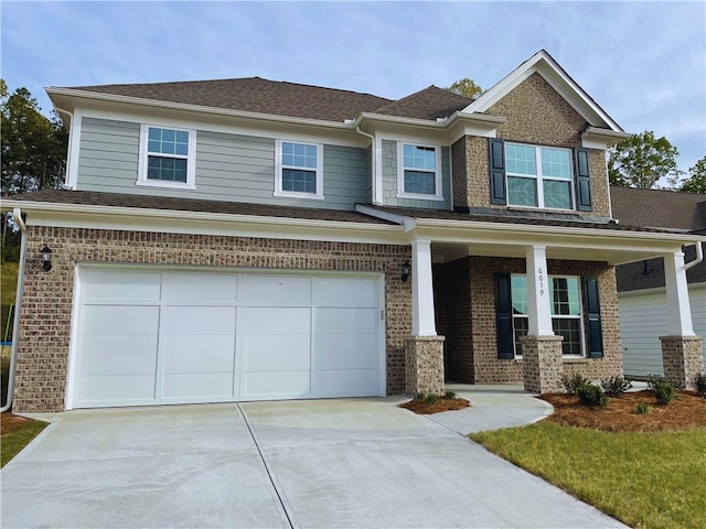 craftsman-style home featuring a garage