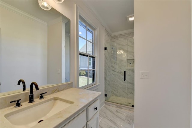 full bath with vanity, marble finish floor, a stall shower, and a wealth of natural light