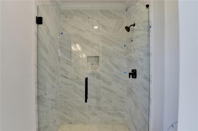 bathroom featuring a stall shower