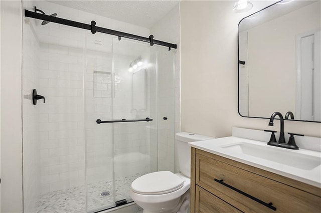 3021 Mills Ridge Dr, Canton, GA 30114 - full bathroom featuring toilet, a shower stall, and vanity