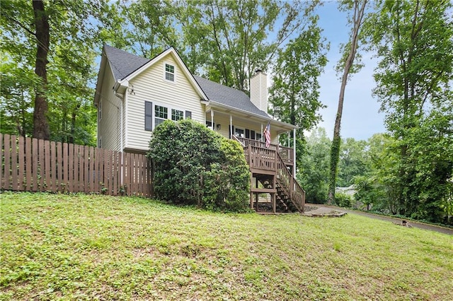 3021 Mills Ridge Dr, Canton, GA 30114 - back of house with a chimney, stairs, and roof with shingles