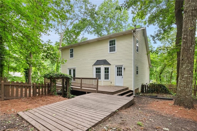 3021 Mills Ridge Dr, Canton, GA 30114 - rear view of property featuring a deck and a fenced backyard