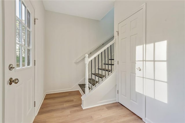 70 Wheeler Lake Path, Dallas, GA 30157 - entryway with stairway, light wood-style flooring, and baseboards