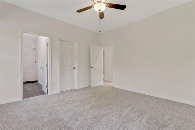 70 Wheeler Lake Path, Dallas, GA 30157 - unfurnished bedroom with carpet flooring, baseboards, a ceiling fan, and ensuite bathroom