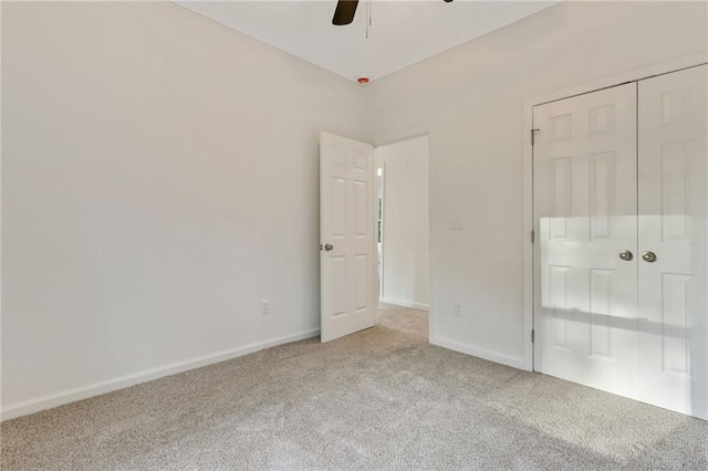 70 Wheeler Lake Path, Dallas, GA 30157 - unfurnished bedroom with carpet flooring, baseboards, a closet, and a ceiling fan