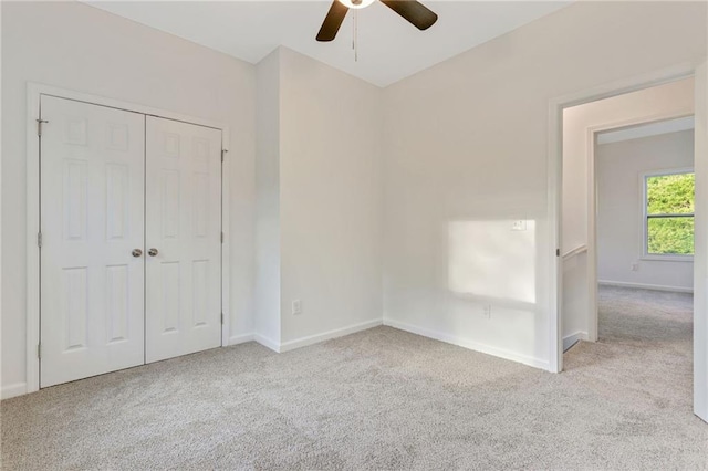 70 Wheeler Lake Path, Dallas, GA 30157 - unfurnished bedroom with carpet floors, baseboards, a closet, and ceiling fan