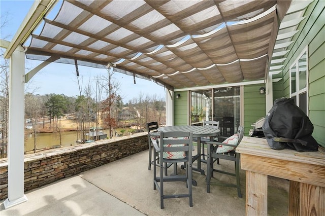 150 Crestview Rd, Jackson, GA 30233 - view of patio / terrace featuring a pergola, outdoor dining space, and a water view