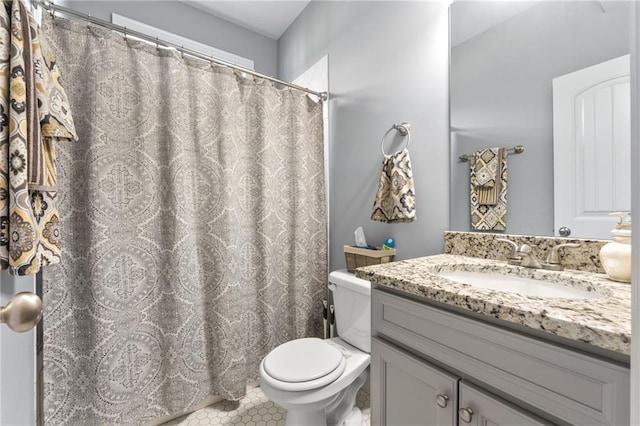 150 Crestview Rd, Jackson, GA 30233 - bathroom featuring toilet, vanity, and tile patterned floors