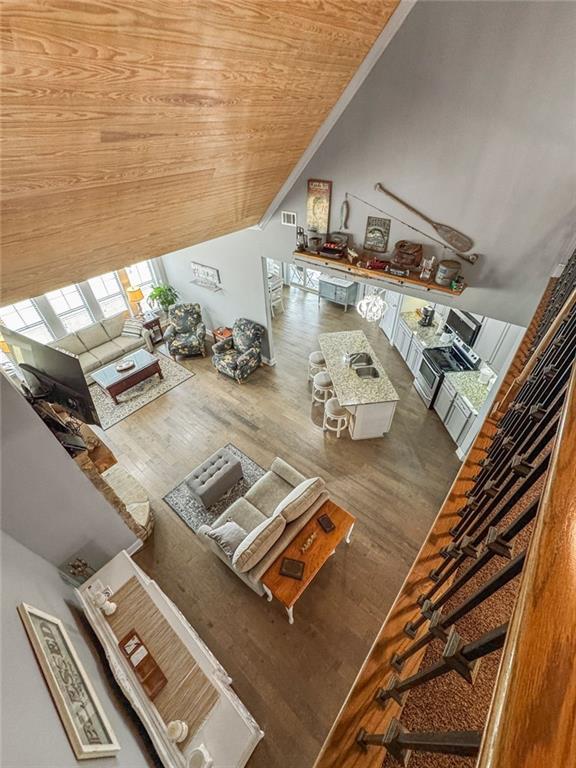 150 Crestview Rd, Jackson, GA 30233 - living area with wood finished floors, wooden ceiling, and vaulted ceiling