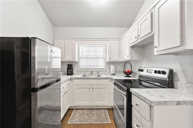 150 Crestview Rd, Jackson, GA 30233 - kitchen with stainless steel appliances, a sink, light countertops, and white cabinets