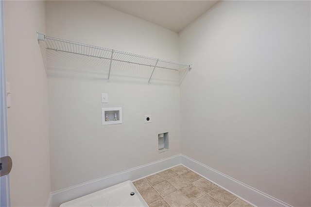 laundry area featuring light tile patterned flooring, electric dryer hookup, and washer hookup