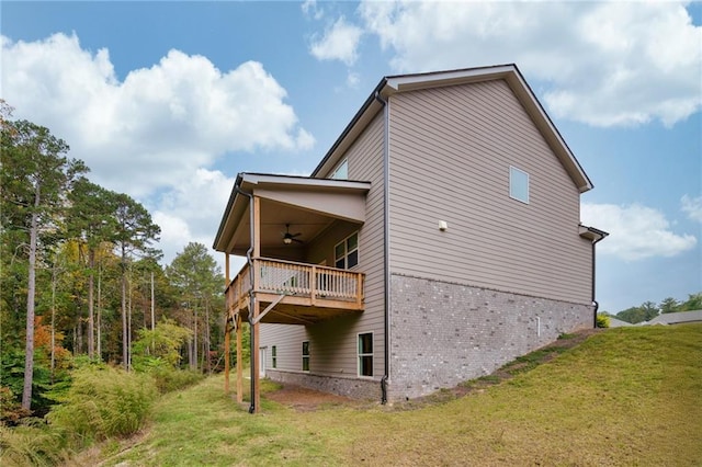 view of side of property with a lawn