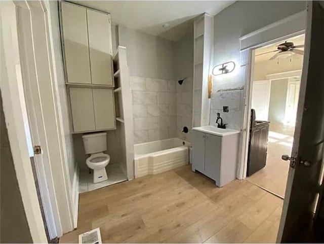 1127 Metropolitan Pkwy SW, Atlanta, GA 30310 - full bath with toilet, wood finished floors, ceiling fan, tub / shower combination, and vanity