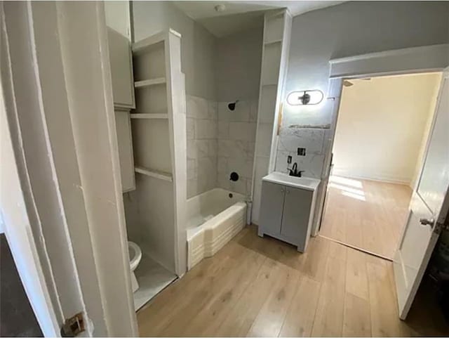 1127 Metropolitan Pkwy SW, Atlanta, GA 30310 - full bath with wood finished floors, toilet, vanity, and shower / washtub combination