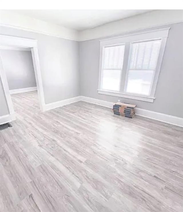 1127 Metropolitan Pkwy SW, Atlanta, GA 30310 - unfurnished room featuring baseboards and wood finished floors