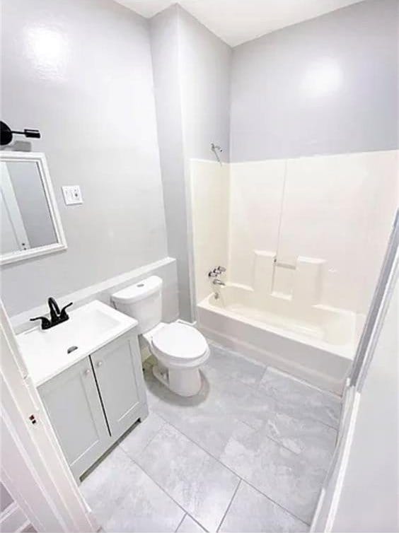 1127 Metropolitan Pkwy SW, Atlanta, GA 30310 - bathroom featuring vanity, toilet, and shower / bath combination