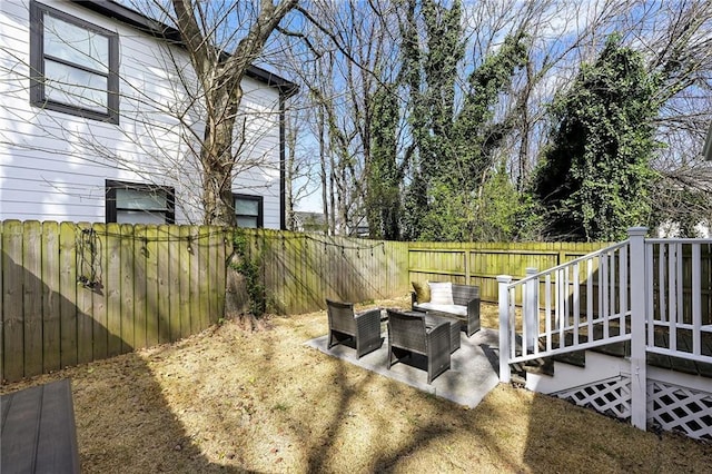 view of yard featuring an outdoor hangout area and a fenced backyard