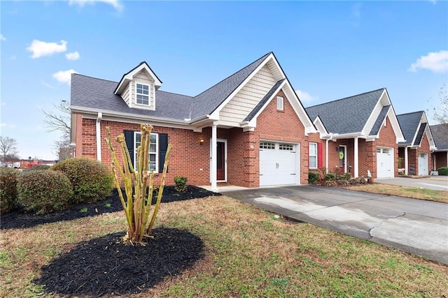 view of front of property with concrete driveway, an attached garage, brick siding, and a shingled roof