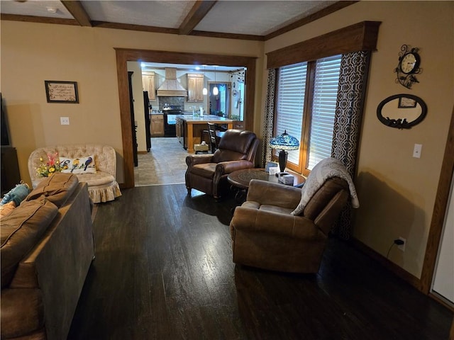 living area with light wood-style flooring and beamed ceiling