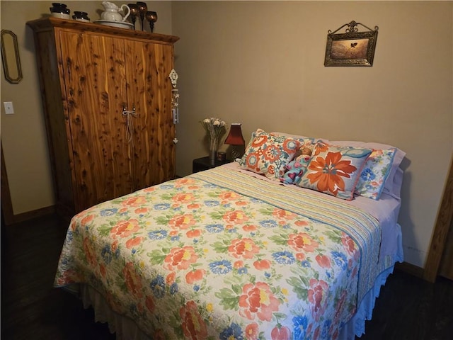 bedroom featuring baseboards