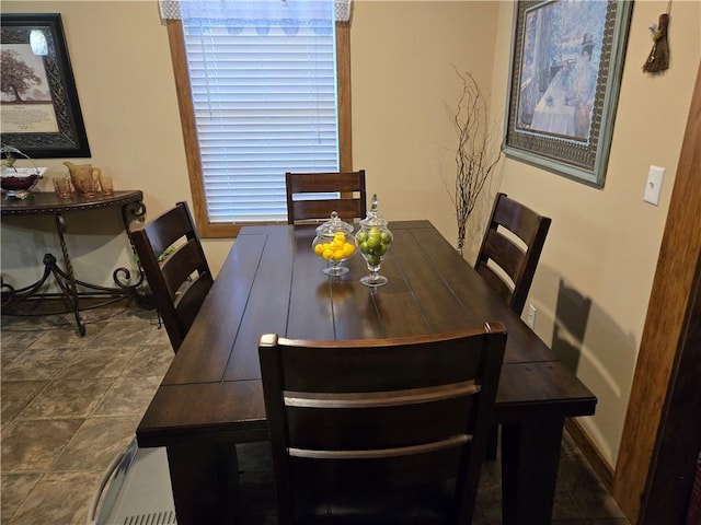 dining room with baseboards