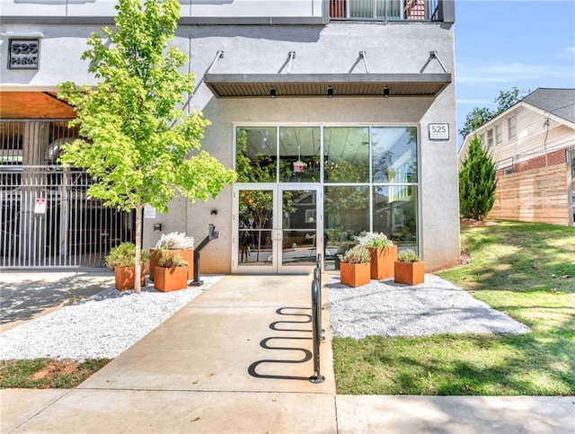 back of house featuring a balcony and a patio