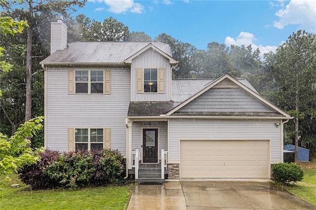 1549 Miller Valley Dr, Bethlehem, GA 30620 - view of front facade with a garage, a chimney, concrete driveway, board and batten siding, and a front lawn