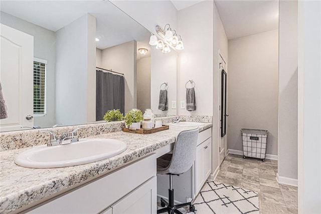1549 Miller Valley Dr, Bethlehem, GA 30620 - bathroom with double vanity and baseboards