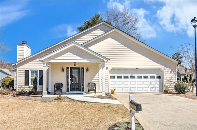 view of front of home featuring covered porch, a chimney, concrete driveway, and an attached garage