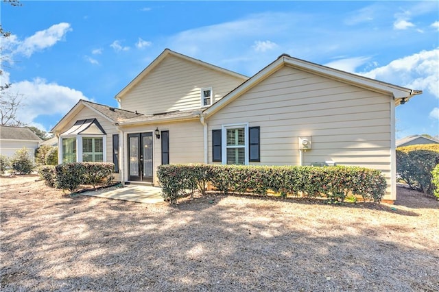 back of house with french doors