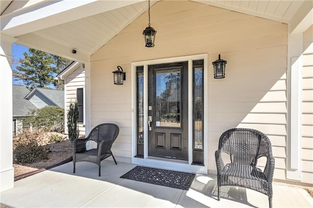 doorway to property with a porch