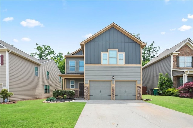 view of front of house with board and batten siding, an attached garage, concrete driveway, stone siding, and a front lawn