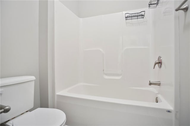 full bathroom featuring toilet and washtub / shower combination