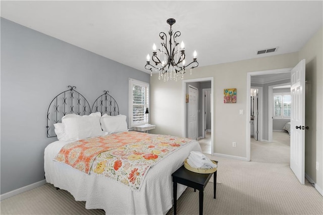 bedroom with light colored carpet, visible vents, and baseboards