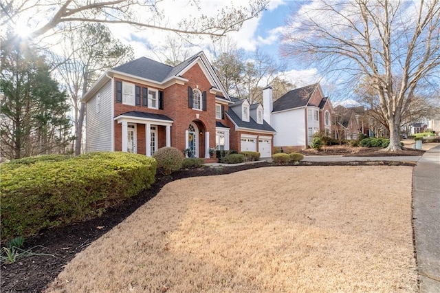 view of front of house featuring brick siding and a residential view