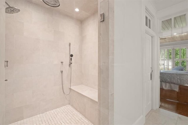 bathroom featuring a tile shower