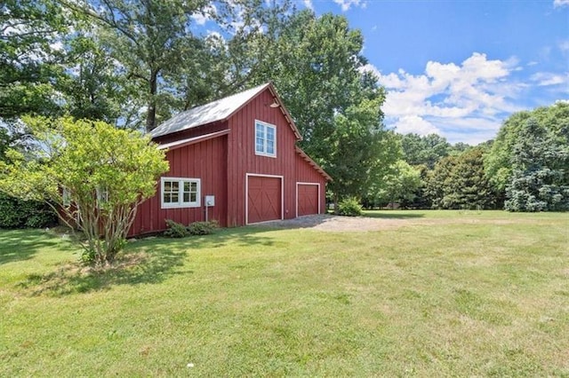 view of outdoor structure featuring a yard