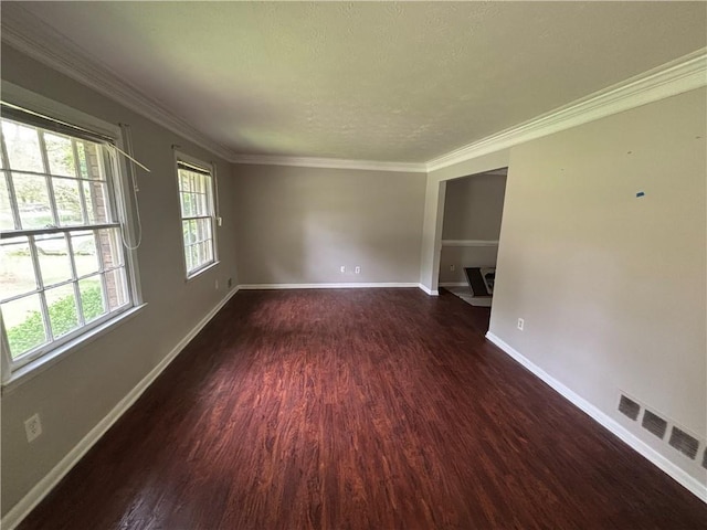 4135 Moore Rd, Conley, GA 30288 - empty room with dark wood-type flooring, baseboards, ornamental molding, and a textured ceiling